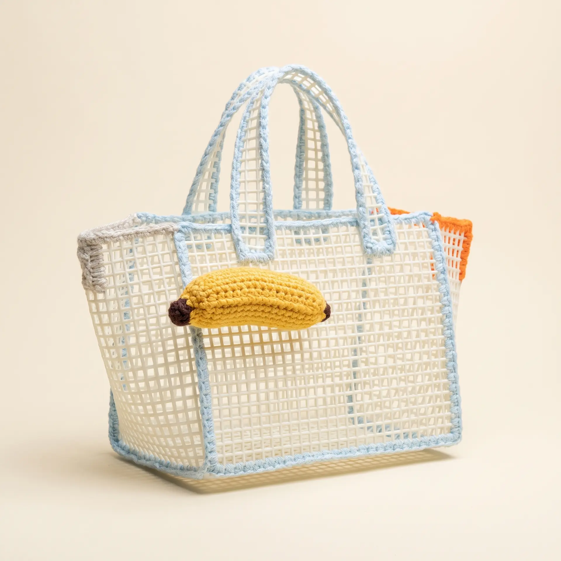 Cream mesh tote with a crochet banana charm